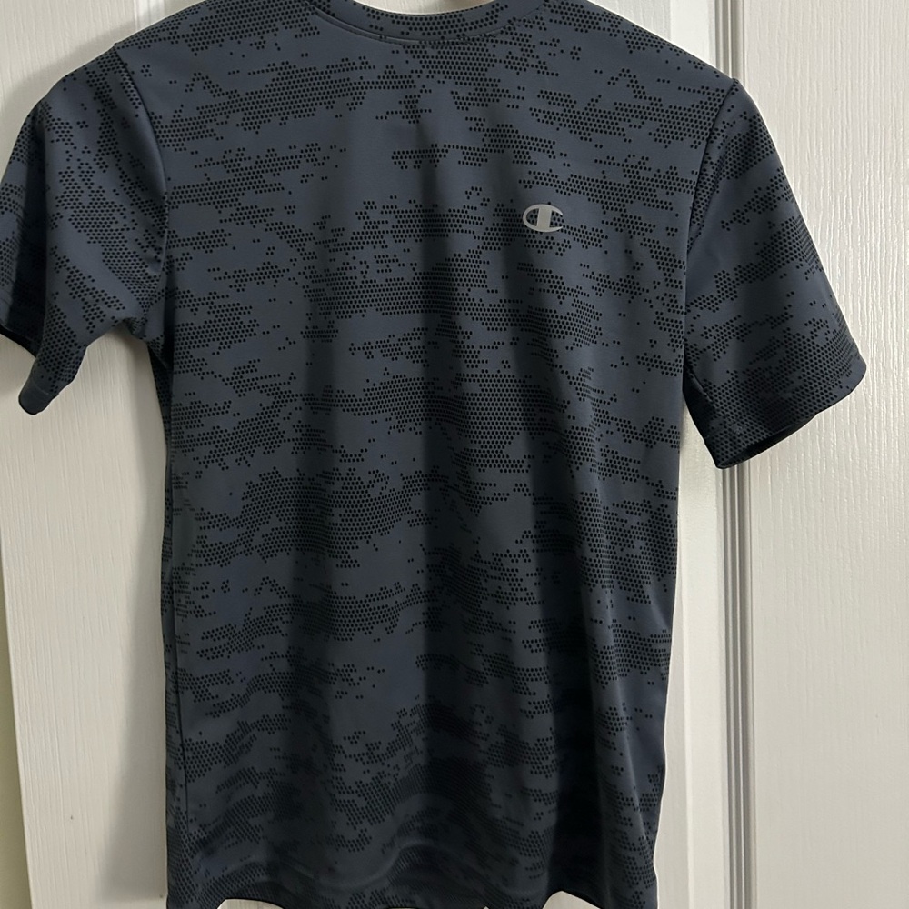 Boys shirt fits small